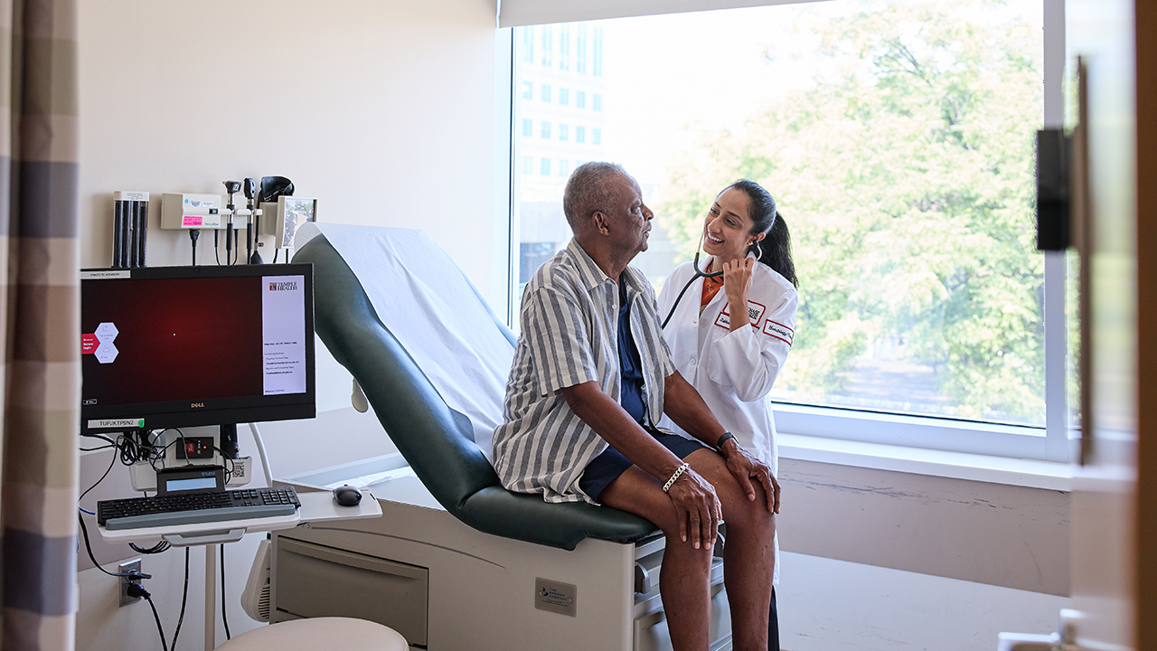 Dr. Padda with a patient