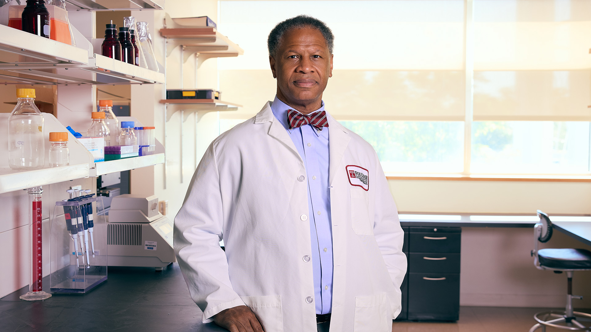 Portrait of Dr. Robert A. Winn in research laboratory