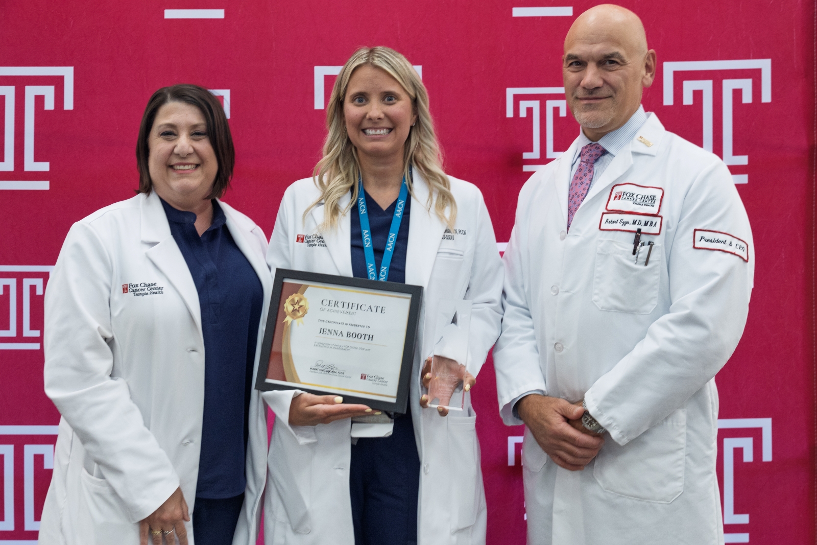 Jenna Booth, MSN, RN, PCCN (center), with Christina Passio, MSN, RN, NE-BC (left), and Robert Uzzo, MD, MBA, FACS