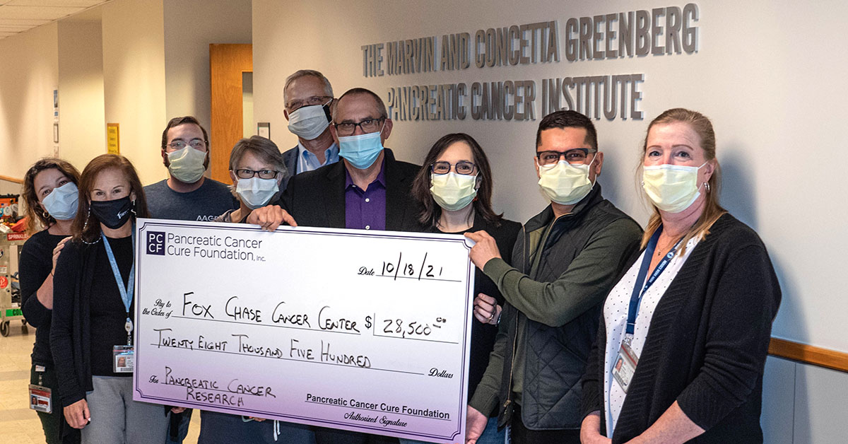 Dr. Cukierman (third from right) presented with donation of $28,500 for her lab's research on pancreatic cancer by the Pancreatic Cancer Cure Foundation