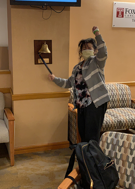 Sandi ringing the bell at the end of her chemotherapy treatments.