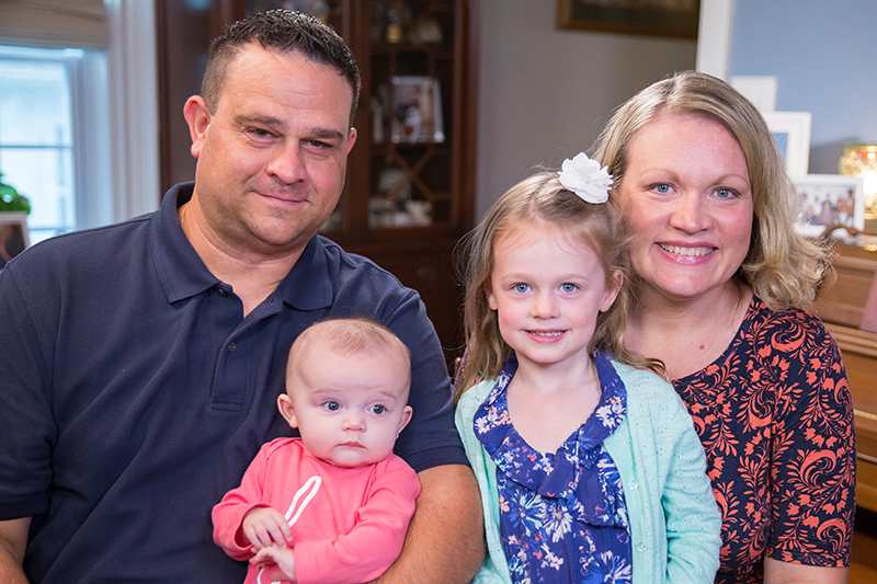 Shelby with her husband and two daughters