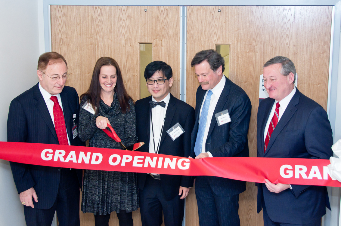 Heather cut the ribbon at the BMT outpatient clinic grand opening in February 2016.