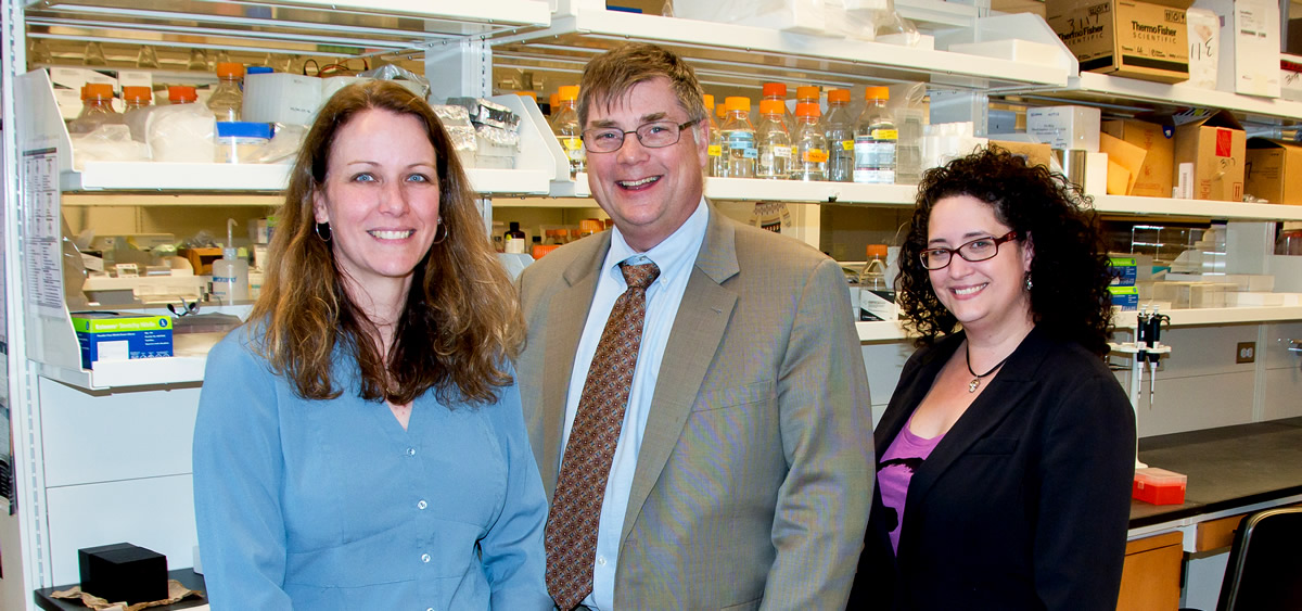 Left to right: Alana O'Reilly; J. Robert Beck, MD, Senior Vice-President and Chief Academic Officer; Dara Ruiz-Whalen. [photo: Joe Hurley]