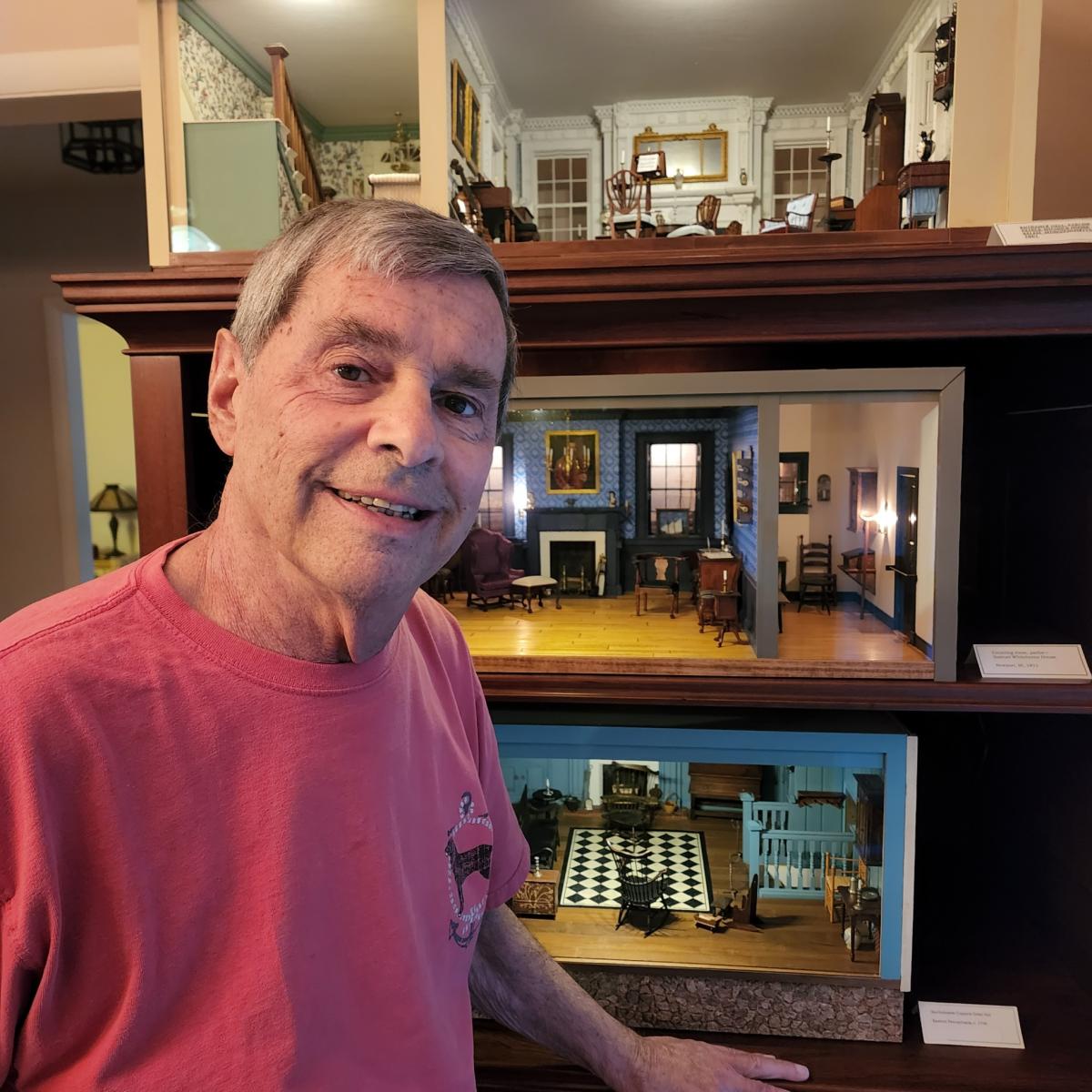 Peter Kendall with one of the miniature houses he made.