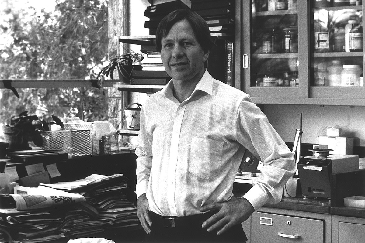 W. Thomas London in his lab, (undated photo)