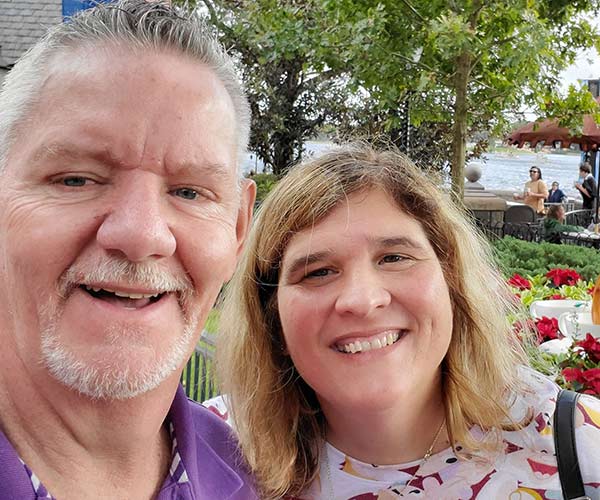 Thomas Nixon flashes a smile with his wife Annette.