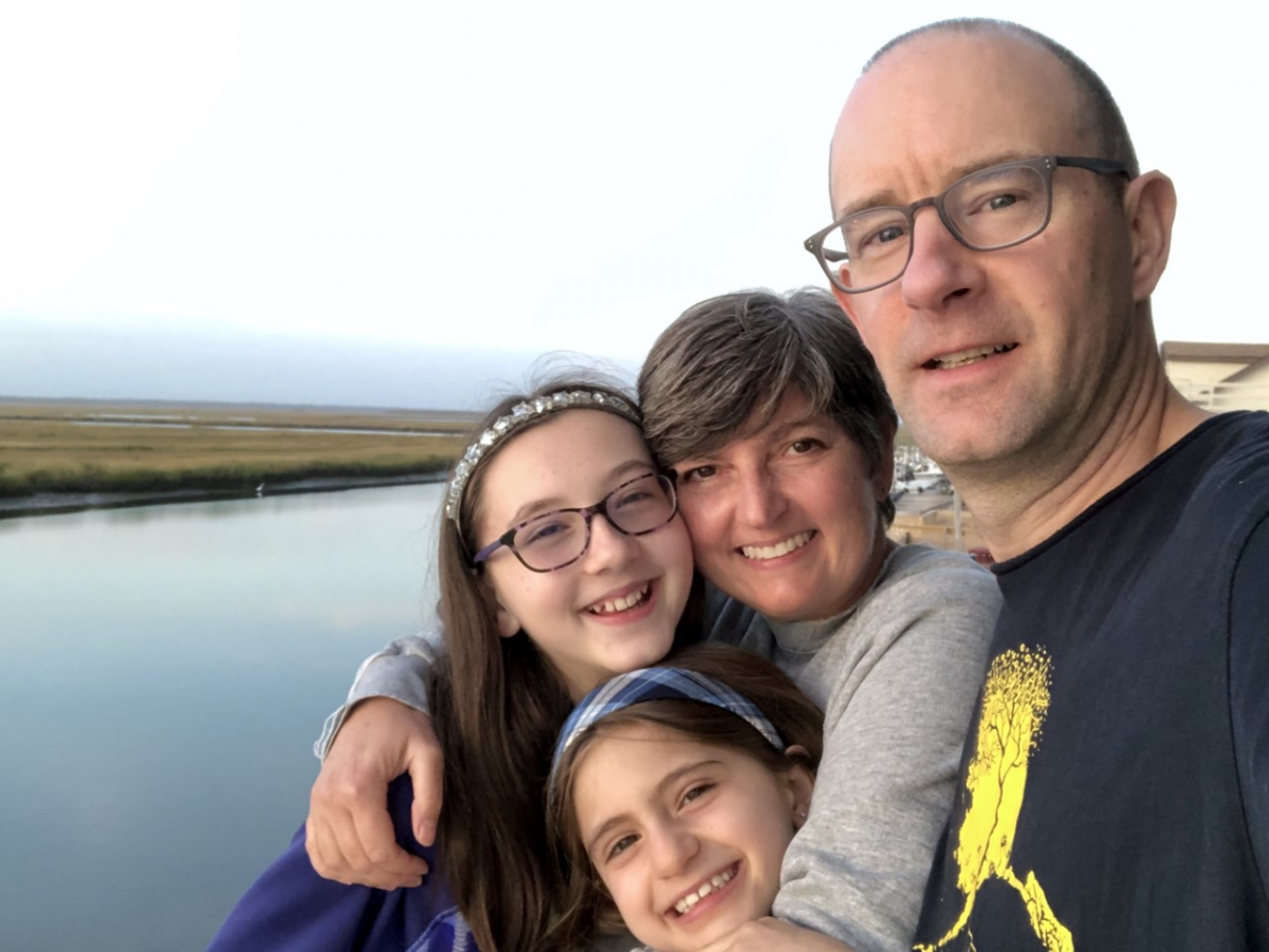 Tina Pidgeon with her husband and two daughters.