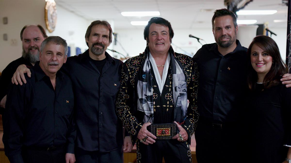 Robert Lougheed poses with bandmates in the "Bob Lougheed & The Memphis Mafia" before a show