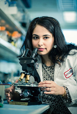 Aurora Sanjee with the Hungerford microscope.