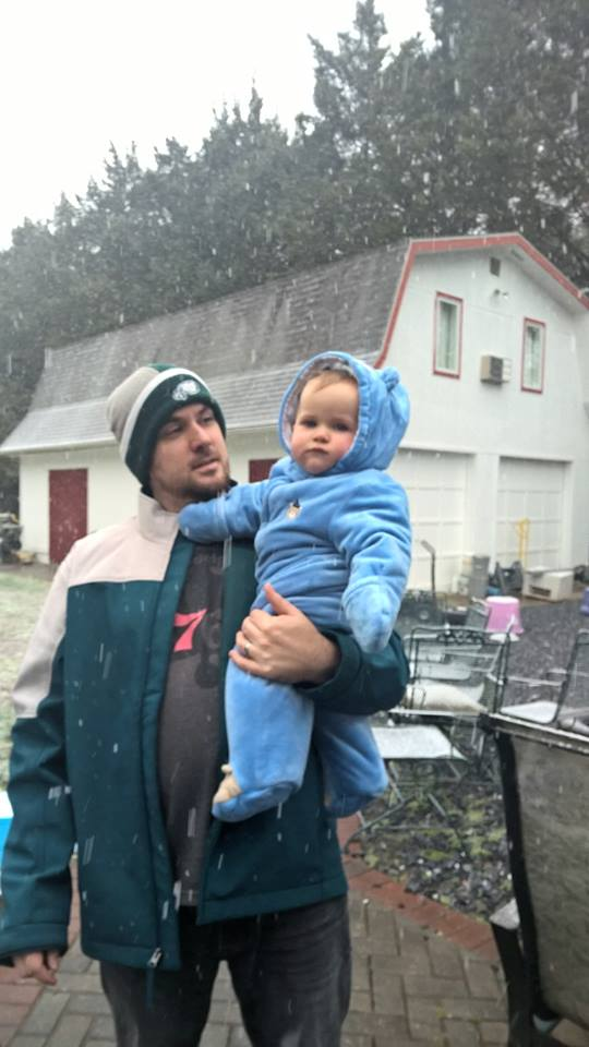 William loves playing in the snow with his son, Liam.