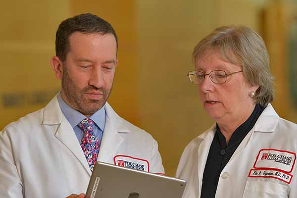 Richard Bleicher with Dr. Elin Sigurdson, a co-author of the study. “At minimum, these findings also suggest the need for long-term follow-up in women who are observed and better prediction of which subset of DCIS will develop an invasive component,” the authors wrote.