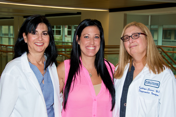 Patti is pictured with her medical oncologist, Lori Goldstein (left) and her radiologist, Kathy Evers (right).