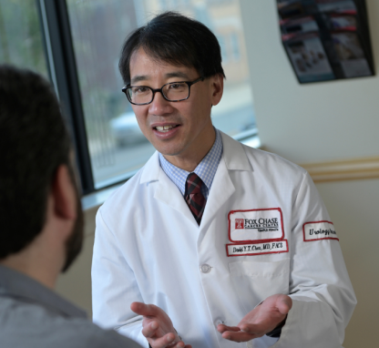 Dr. Chen with a patient