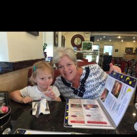 Fowler with granddaughter at resturant.jpg