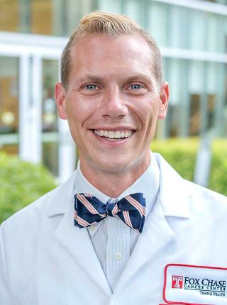Austin D. Williams, MD, MSEd, a surgeon in breast cancer and an assistant professor in the Department of Surgical Oncology