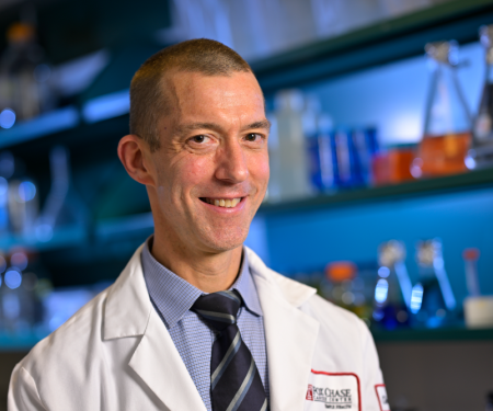 Dr. Michael J. Hall in a laboratory
