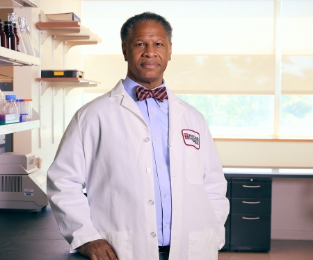 Portrait of Dr. Robert A. Winn in research laboratory