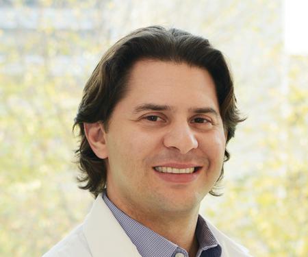 A portrait shot of Matthew R. Zibelman, MD, smiling at the camera.