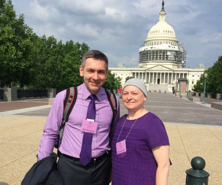 A photograph of Igor Astsaturov, MD, PhD, and patient Melissa Kartasevich, standing outside the White House.