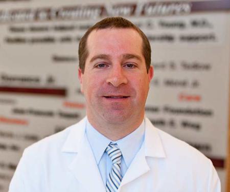 Eric D. Tetzlaff, MHS, PA-C, DFAAPA