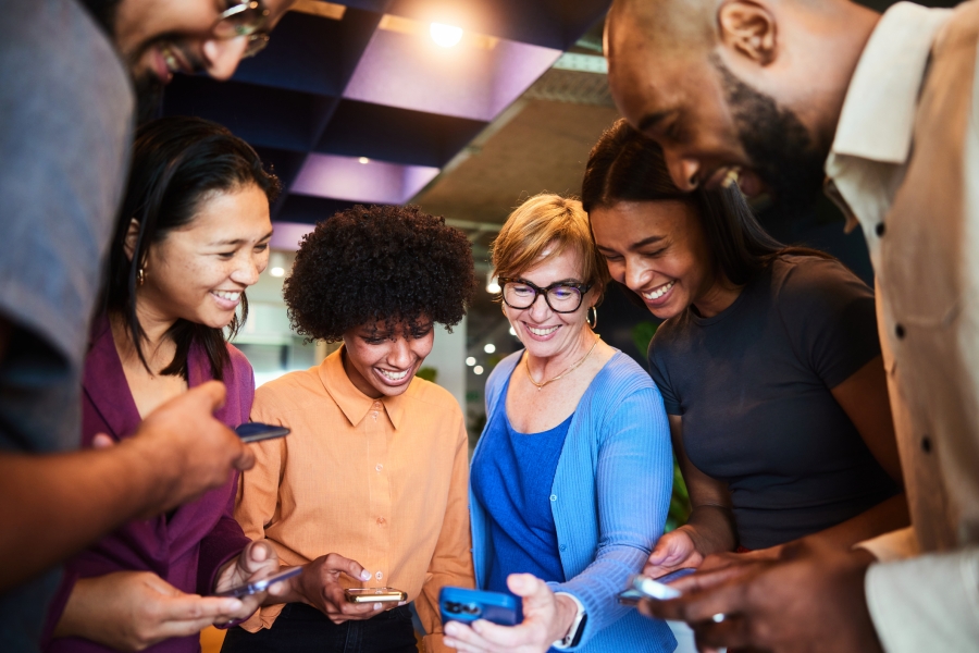 Group of people looking at phones