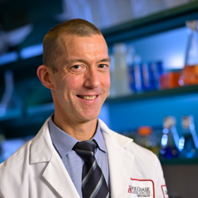 Dr. Michael J. Hall in a laboratory