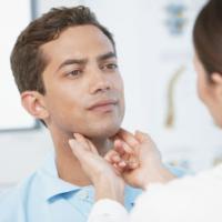 A poster reading &quot;Oral, Head &amp; Neck Cancer Awareness Week, free screening events hosted by the Temple Head and Neck institute.&quot;&quot;
