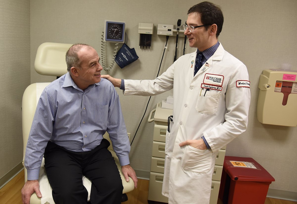 Tom with Dr. Geynisman, lead on the RETAIN clinical trial